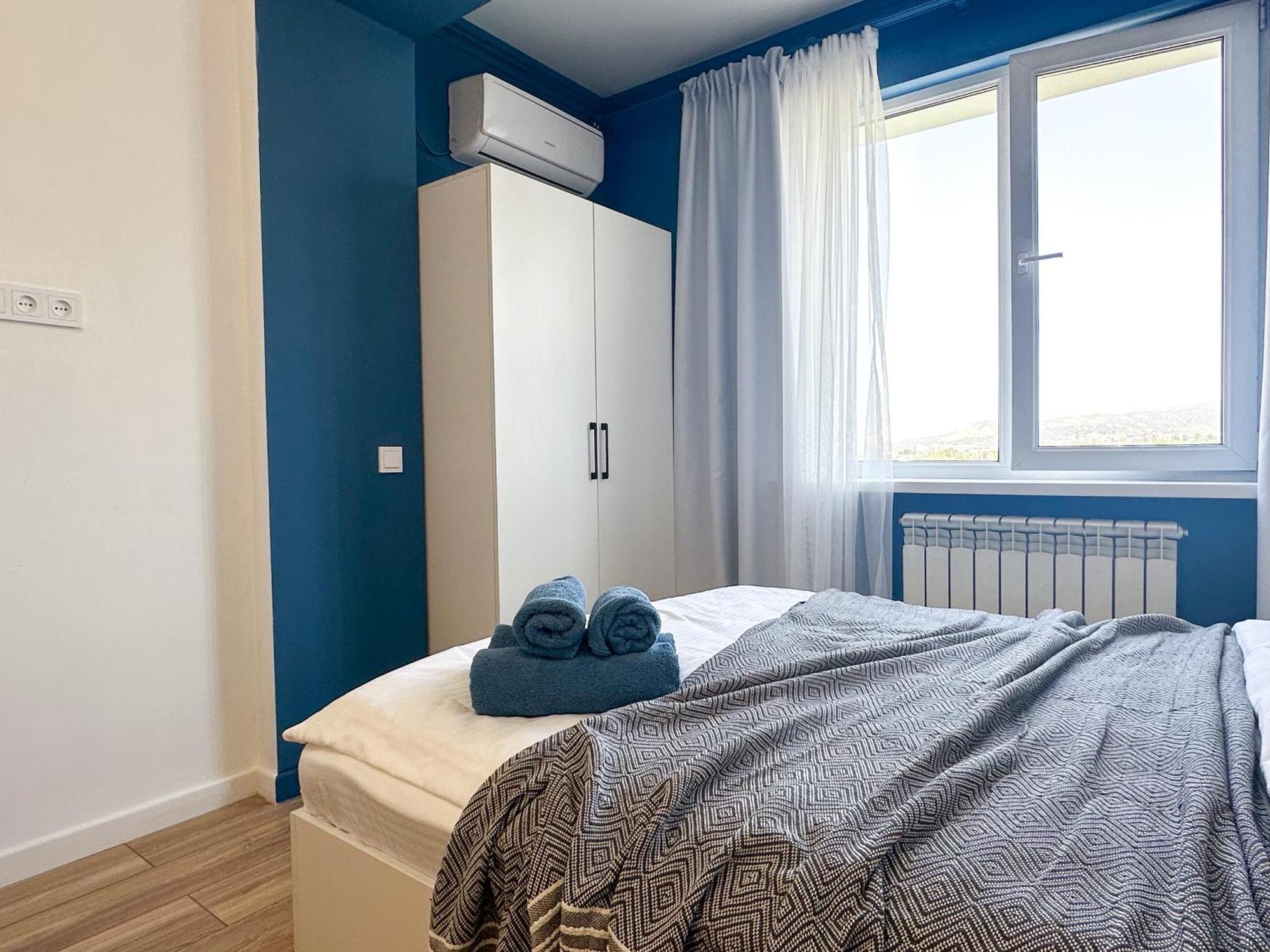 Adt Apartments Алма Ата Стая снимка